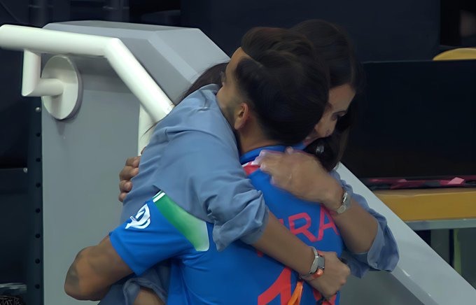 Virat Kohli is hugged by Anushka Sharma after India wins the ICC Champions Trophy in 2025